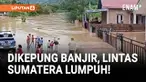 Akses Jalan Lintas Sumatera (Jalinsum) Padang–Bengkulu lumpuh total akibat banjir yang menggenangi badan jalan di Kabupaten Pesisir Selatan, Sumatera Barat, Senin pagi.