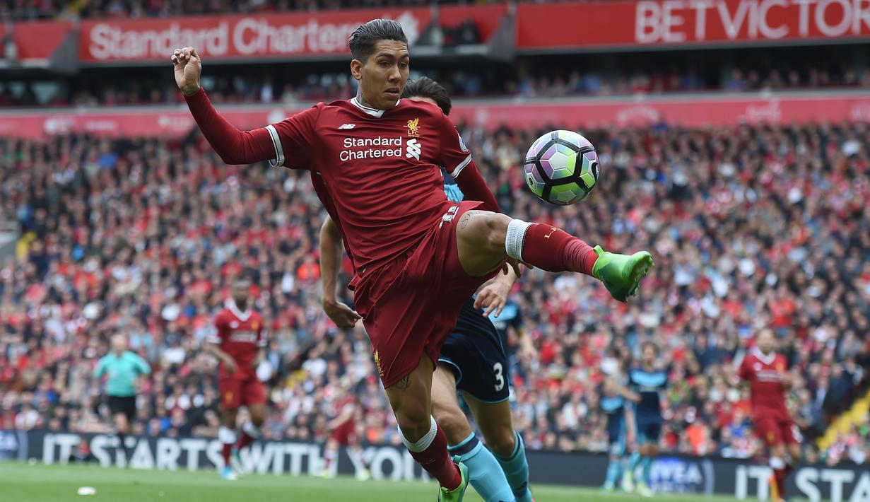 Pemain Liverpool, Roberto Firmino masih menjadi pilihan utama Jurgen Klopp untuk membobol jala lawan. Musim 2016-2017, Firmino tampil sebanyak 36 kali dan mencetak 11 gol. (AFP/Paul Ellis)