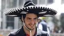 Carlos Sainz, pria asal Spanyol ini memiliki paras tampan khas pria Latin. (EPA/Ulises Ruiz Basurto) 