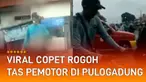 Pria berjaket abu-abu tampak merogoh mengintip dan merogoh tas pemotor.