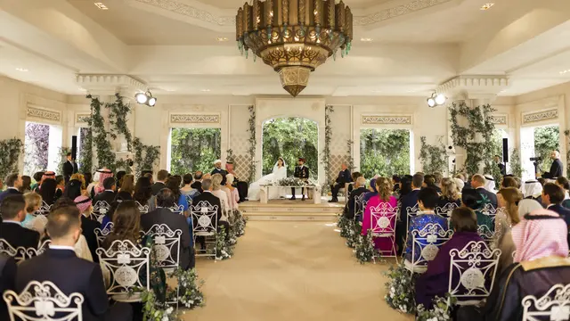 Pernikahan Pangeran Hussein dan Rajwa Al Saif. (Royal Hashemite Court via AP)