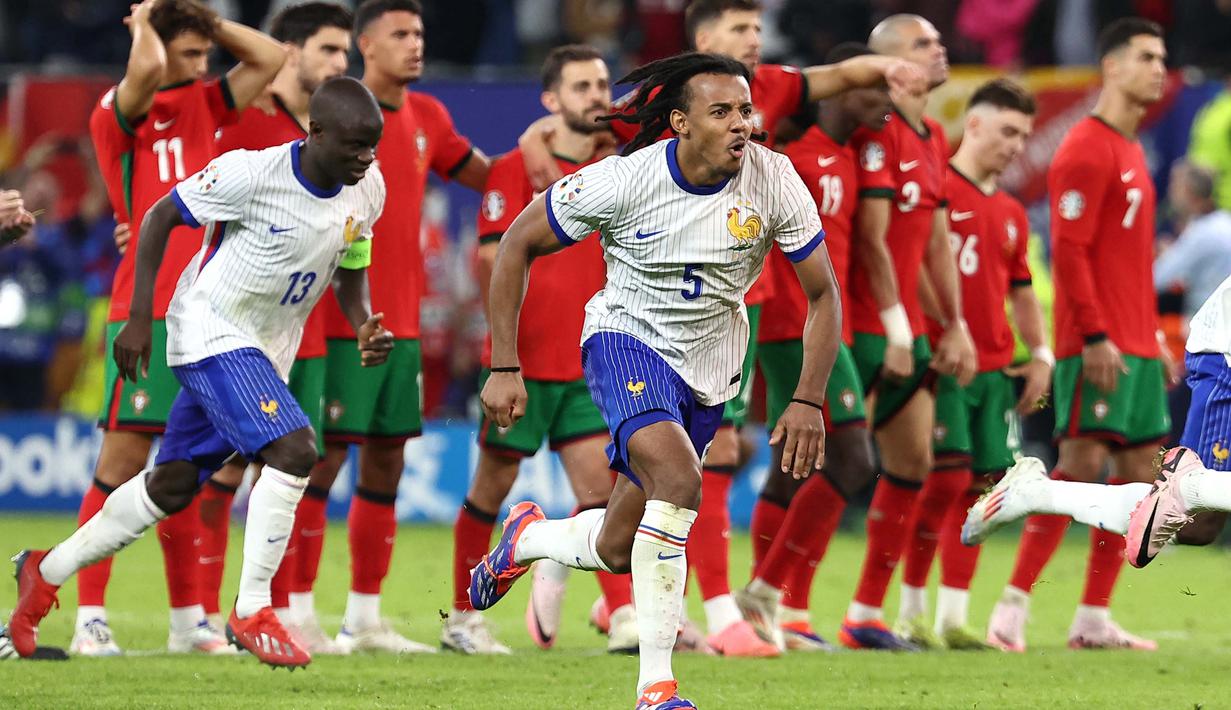 Prancis menjadi pemenang setelah mengungguli Portugal di babak adu penalti (5-3). (FRANCK FIFE/AFP)
