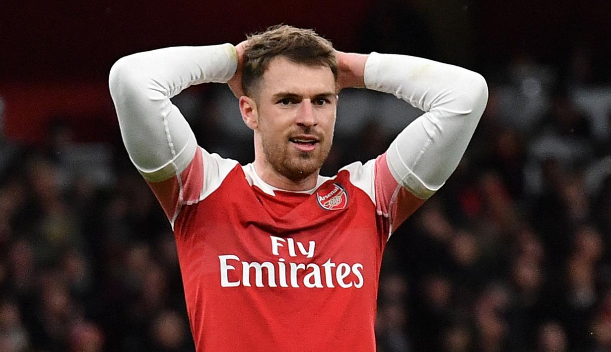 Aaron Ramsey menjelma menjadi pemain penting di skuat Arsene Wenger setelah didatangkan dari Cardiff City saat berusia 17 tahun. Ia tercatat telah mempersembahkan tiga gelar Piala FA untuk Arsenal. Sayangnya The Gunners harus melepasnya akibat sering terkena masalah cedera. (AFP/Ben Stansall)