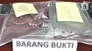 Sejumlah barang bukti milik Denny Hendrianto diperlihatkan saat rilis kasus begal payudara di Mapolda Metro Jaya, Jakarta, Senin (20/1/2020). Aksi cabul Denny yang sempat viral di media sosial itu diakui telah dilakukan selama lima kali dengan korban mayoritas ibu-ibu. (merdeka.com/Iqbal S. Nugroho)