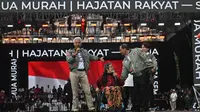 Calon Presiden dan Calon Wakil Presiden nomor urut 3 Ganjar Pranowo dan Mahfud Md saat kampanye akbar pemilu 2024 di Semarang, Jawa Tengah, pada 10 Februari 2024. (JUNI KRISWANTO/AFP)