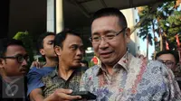 Anggota DPR Komisi III Fraksi Gerindra Wihadi Wiyanto memberikan keterangan usai diperiksa di Gedung KPK, Jakarta, (18/8). Wihadi diperiksa sebagai saksi tersangka anggota DPR Komisi III Fraksi Demokrat I Putu Sudiartana . (Liputan6.com/Helmi Afandi)