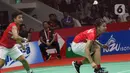 Pebulutangkis Indonesia, Greysia Polii/Apriyani Rahayu saat melawan Maiken Fruergaard/Sara Thygesen (Denmark) pada final ganda putri Indonesia Masters 2020 di Istora GBK, Jakarta, MInggu (19/1/2020). Greysia/Apriyani unggul 18-21 21-11 23-21. (Liputan6.com/Helmi Fithriansyah)