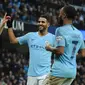 Pemain Manchester City Phil Foden (kiri) merayakan dengan rekan satu timnya setelah mencetak gol ke gawang Rotherham United pada putaran ketiga Piala FA di Stadion Etihad, Manchester, Inggris, Minggu (6/1). (AP Photo/Rui Vieira)