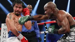 Manny Pacquiao (kiri) vs Timothy Bradley (REUTERS/Steve Marcus)
