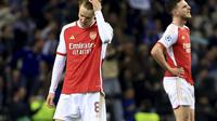 Dua pemain Arsenal, Declan Rice dan Martin Odegaard, menyesali kekalahan yang diderita dari FC Porto pada leg 1 babak 16 besar Liga Champions 2023/2024, Kamis (22/2/2024), dini hari WIB.&nbsp;(AP Photo/Luis Vieira)