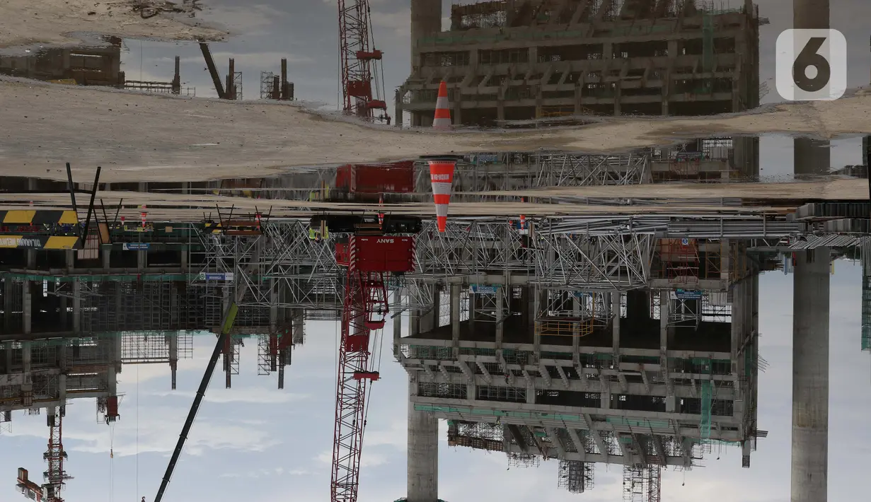 Foto refleksi perkembangan pembangunan Jakarta International Stadium, Jumat (23/10/2020). Hingga pekan ke-59, progres konstruksi Jakarta International Stadium sudah mencapai 31,89 persen dan ditarget akan selesai pada akhir 2021. (Liputan6.comHelmi Fithriansyah)
