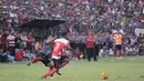 Madura United menjadi klub baru yang memiliki potensi untuk menjadi klub besar karena memiliki basis masa pendukung yang loyal. (Bola.com/Vitalis Yogi Trisna)