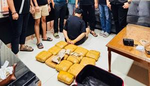 Tersangka dan barang bukti 13 kilogram ganja diamankan polisi (Istimewa)