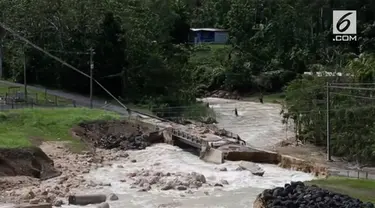 Akibat dihatam badai Maria, sebuah bendungan di Puerto Rico rusak. Warga yang tinggal disekitar bendungan, terpaksa mengungsi.