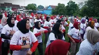 Relawan calon presiden Ganjar Pranowo yang tergabung dalam KawanJuangGP menggalang dukungan dan perkuat basis suara di Jawa Barat untuk kemenangan di Pilpres 2024. (Foto: Istimewa).