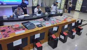 Suami Istri China Kendalikan Judi Online Berkedok Aplikasi Game