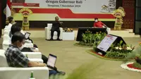 Ketua Dewan Komisioner OJK Wimboh Santoso melakukan pertemuan dengan Gubernur Bali I Wayan Koster