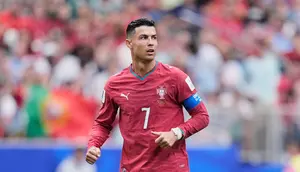 Pemain Portugal, Cristiano Ronaldo beraksi dalam pertandingan melawan RD Kongo di Piala Dunia 2026, Kamis (18/6/2026) dini hari WIB. (AP Photo/Ashley Landis)