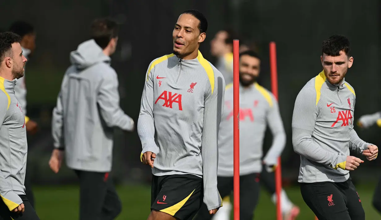 Untuk diketahui, kedua tim sama-sama memuncaki klasemen liga domestik. (Paul ELLIS/AFP)