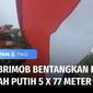 Anggota TNI Brigif Badik Sakti, dan Brimob B Pelopor, membentangkan Bendera Merah Putih berukuran 5 x 77 meter, di Puncak Gunung Lanyer, Parepare, Sulawesi Selatan, pada Selasa (16/08) kemarin.