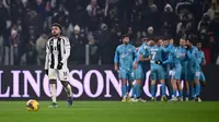Gelandang Juventus asal Amerika Serikat bernomor punggung 16, Weston McKennie, bereaksi selama pertandingan Seri A Italia antara Juventus FC dan Venezia FC di Stadion Allianz di Turin, Minggu dini hari WIB (15/12/2024). (MARCO BERTORELLO/AFP)