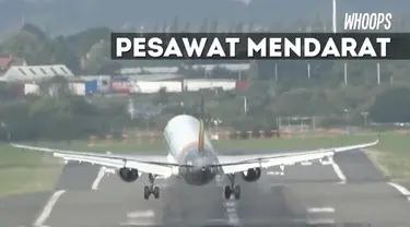 Pesawat yang sedikit lagi akan mendarat menjadi miring dan kembali lagi ke udara.