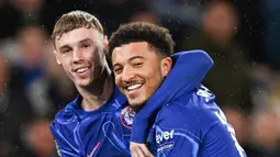 Pesta lima gol Chelsea disumbang oleh Axel Disasi, Christopher Nkunku, Noni Madueke, Cole Palmer, dan Jadon Sancho. Southampton sempat membalas melalui Joe Aribo di menit ke-11. (AFP/Glyn Kirk)
