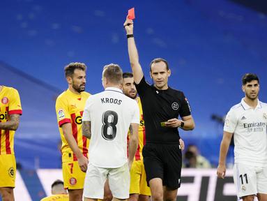 Toni Kroos akhirnya mendapat kartu merah pertama di sepanjang karier di sepak bola profesionalnya. (AP/Jose Breton)