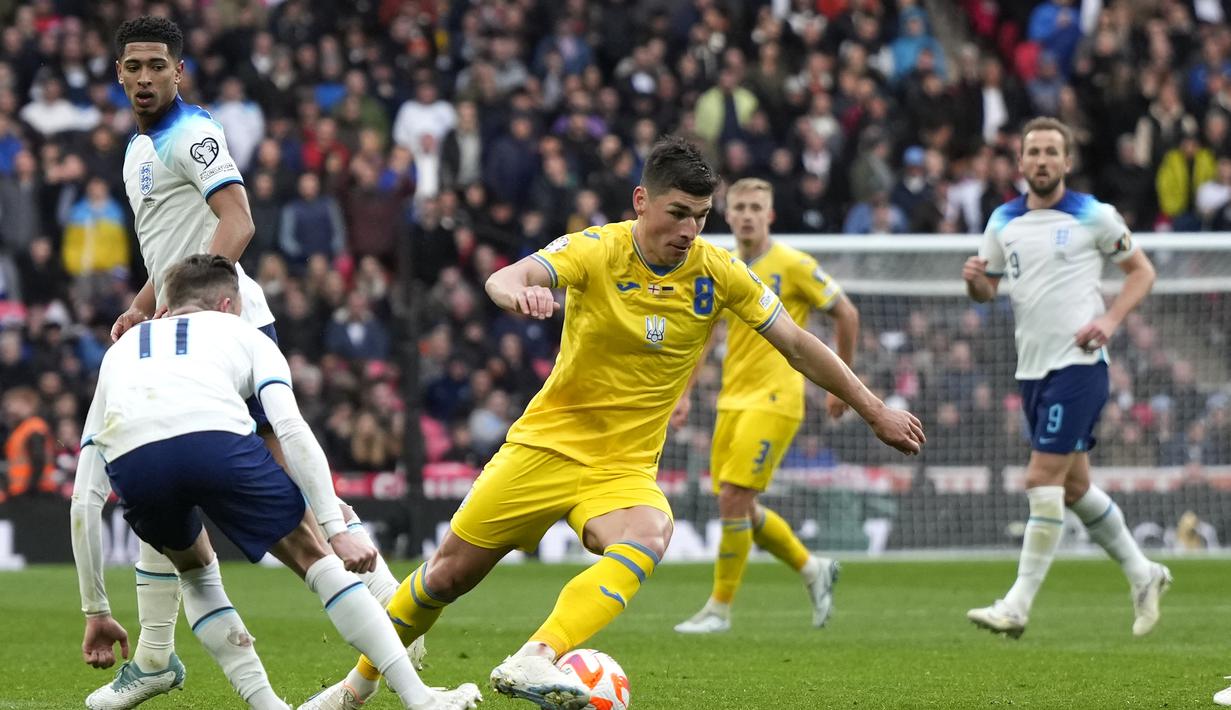 Inggris mendominasi pertandingan ini. Hingga menit ke-70, Inggris telah melepaskan 12 tembakan dengan lima di antaranya mengarah ke gawang Ukraina. (AP Photo/Alastair Grant)