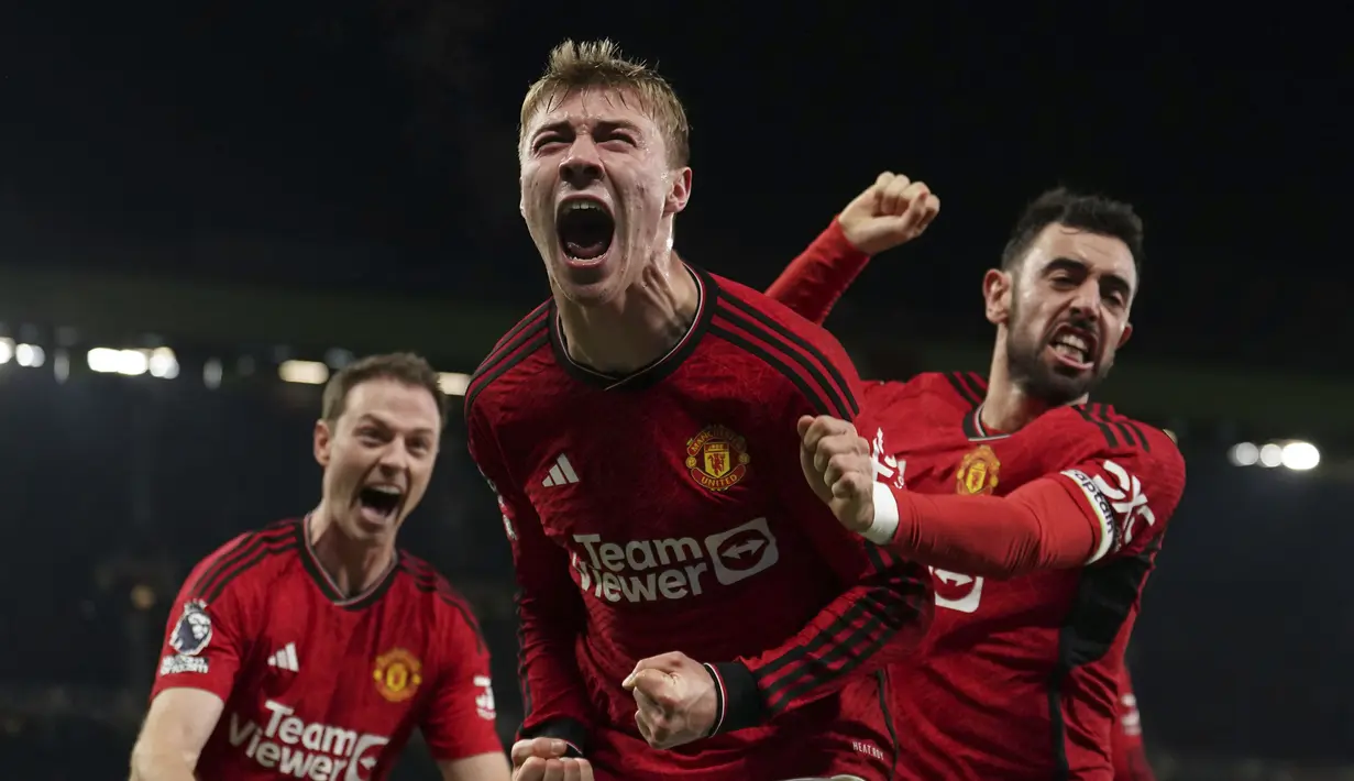 <p>Gol-gol Man United dicetak Alejandro Garnacho dan Rasmus Hojlund. (Martin Rickett/PA via AP)</p>