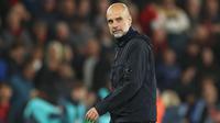 Meskipun begitu, Pep Guardiola telah memberikan dua gelar juara untuk Manchester City pada musim ini dengan trofi FA Cup dan trofi Carabao Cup. (AP Photo/Ian Walton)