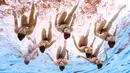 Tim renang artistik Korea Selatan beraksi dalam Kejuaraan Renang Dunia 2019 di Yeomju Gymnasium, Gwangju, Korea Selatan, Rabu (17/7/2019). (François-Xavier MARIT/AFP)