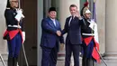 Undangan sebagai tamu kehormatan di Bastille Day merupakan kehormatan bagi bangsa Indonesia di panggung diplomasi internasional. (Ludovic MARIN/AFP)