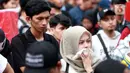 Para calon penonton dipisahkan melalui antrean yang sesuai dengan zona menonton di Stadion Utama Gelora Bung Karno (SUGBK).  (Bola.com/M Iqbal Ichsan)