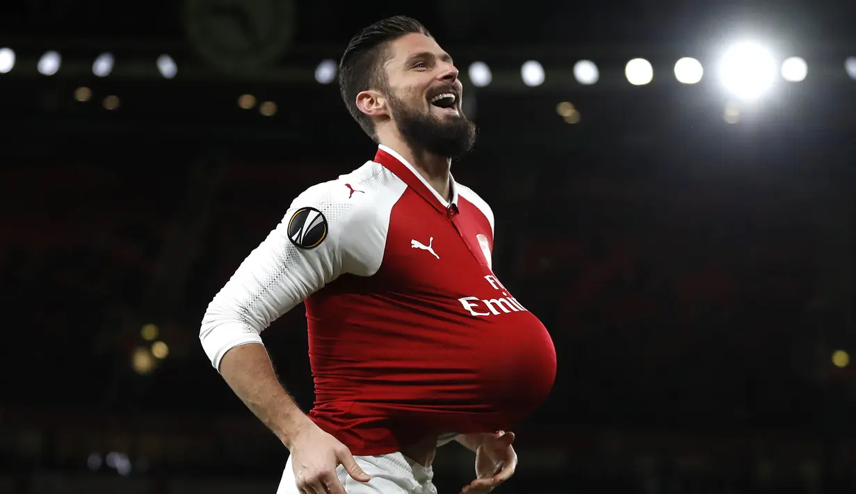 Striker Arsenal, Olivier Giroud, melakukan selebrasi usai mencetak gol ke gawang BATE Borisov pada laga Liga Europa di Stadion Emirates, Jumat (8/12/2017). Arsenal menang 6-0 atas BATE Borisov. (AP/Kirsty Wigglesworth)