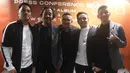 Grup band Ungu berfoto bersama usai acara peluncuran album terbaru Self-titled di Gedung Sarinah, Jakarta, Selasa (6/9/2022). Grup band Ungu kembali menggebrak kancah permusikan nasional dengan merilis album self-titled berisi 11 lagu baru. (Liputan6.com/Herman Zakharia)