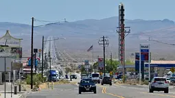 Lebih dari 50 juta warga Amerika Serikat akan terpanggang di bawah suhu yang sangat tinggi minggu ini, mulai dari California, Texas, hingga Florida, seiring dengan gelombang panas yang melanda bagian selatan Amerika Serikat. (Photo by Frederic J. BROWN / AFP)