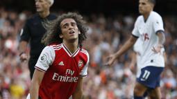 Matteo Guendouzi awalnya merupakan pemain andalan Arteta. Namun, semua berubah ketika insiden Guendouzi mencekik Neil Maupay saat Arsenal kalah 2-1 atas Brighton pada musim 2019/20. Ia dihukum dengan melakukan latihan terpisah dan pada musim berikutnya dipinjamkan ke Herta Berlin. (AFP/Ian Kington)