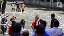 58 RT yang masih terendam banjir tersebar di sejumlah wilayah, di antaranya Jakarta Barat sebanyak tujuh RT, Jakarta Pusat 17 RT, Jakarta Selatan delapan RT dan Jakarta Timur 26 RT. (Liputan6.com/Herman Zakharia)