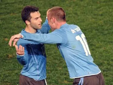 Gelandang Daniele de Rossi turut bergembira atas gol ketiga Italia yang dilesakkan Giuseppe Rossi ke gawang AS dalam pertandingan Piala Konfederasi AS vs Italia pada 15 Juni 2009 di Loftus Versfeld Stadium, Pretoria. AFP PHOTO/VINCENZO PINTO