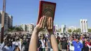 <p>Pembakaran Alquran itu bertepatan dengan dimulainya Idul Adha dan berakhirnya serangkaian ibadah haji di Makkah, Arab Saudi, dan memicu kemarahan di seluruh Timur Tengah. (AP Photo/Hadi Mizban)</p>