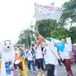 Badan Pengelola Keuangan Haji (BPKH) bersama mitra kerjanya menggelar Fun Walk di kawasan Senayan, Jakarta, Minggu pagi (10/12/2023). (Ist).