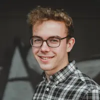 Ilustrasi pria tersenyum, rendah hati. (Photo by Nathan Van de Graaf on Unsplash)