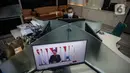 Wartawan membuat berita dan menyaksikan pidato kenegaraan Presiden Joko Widodo di Sidang Tahunan MPR bersama DPR RI dan DPD secara live di Gedung DPR, Senayan, Jakarta, Senin (16/8/2021).  (Liputan6.com/Johan Tallo)