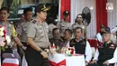 Wakapolda Metro Jaya, Brigjen Pol Purwadi mengikuti apel besar di lapangan Sabhara Mapolda Metro Jaya, Jakarta, Sabtu (12/5). (Liputan6.com/Herman Zakharia)