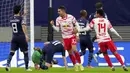 Pemain RB Leipzig Andre Silva (tengah) melakukan selebrasi usai mencetak gol ke gawang Manchester City pada pertandingan sepak bola Grup A Liga Champions di Red Bull Arena, Leipzig, Jerman, 7 Desember 2021. RB Leipzig menang 2-1. (AP Photo/Michael Sohn)