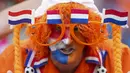 Ekspresi suporter Timnas Belanda saat melawan Polandia pada laga Grup D Euro 2024 di Volksparkstadion, Minggu (16/06/2024). (AP Photo/Sunday Alamba)