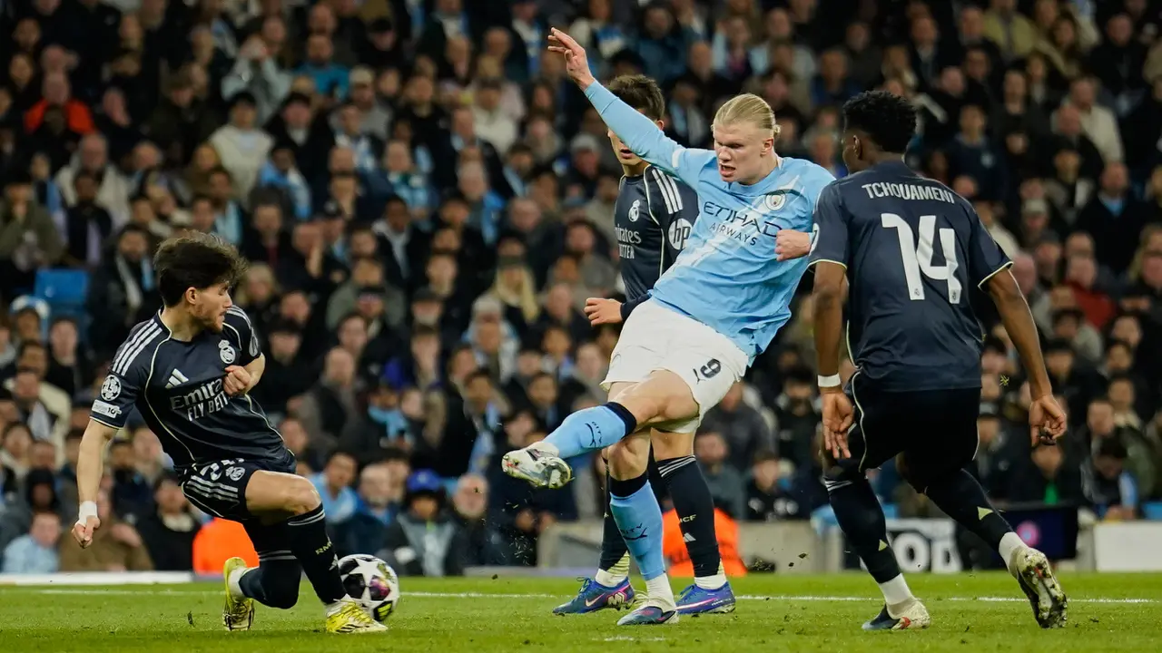 Foto: Dua Gol Vincius Jr untuk Real Madrid Pulangkan Manchester City di Babak 16 Besar Liga Champions