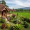Inspirasi Rumah Desa Adem Alami (Image by Gemini AI)