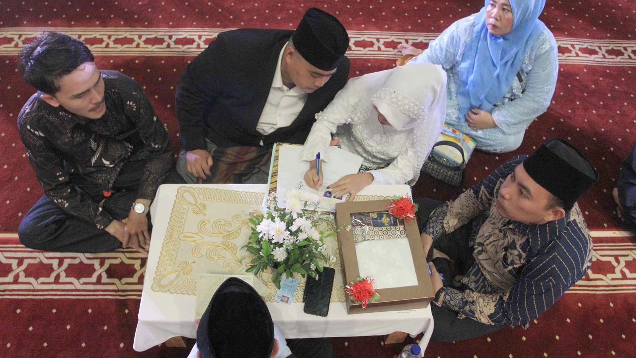FOTO: 51 Pasangan Resmi Menikah Gratis di Masjid Istiqlal